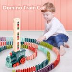 Ensemble train électrique et dominos, son et lumière, pose automatique de dominos
