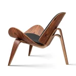 Fauteuil Shell en bois, assise et dossier rembourrés en similicuir, à trois pieds – Image 3