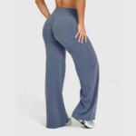 Pantalon de sport taille croisée évasé, tissu respirant et extensible